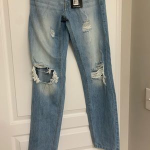 RELAXED FIT VINTAGE JEANS WITH BUSTED KNEE